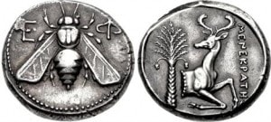 животное и пчела на монете